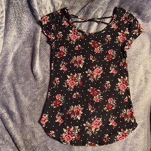 black floral/poka dot covered shirt. By no boundaries. Size medium (7-9)